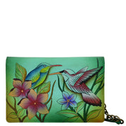 Anna by Anuschka style 1843, handpainted Two Fold Wallet On A String. Birds in Paradise Green painting in green/mint color. Featuring removable strap and credit card holders.