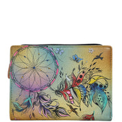 Anna by Anuschka style 1854, handpainted Two Fold Clutch Wallet. Sweet Dreams painting in tan color. Featuring eleven credit card holder, one ID window.