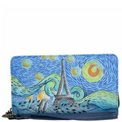 Anna by Anuschka style 1859, handpainted Clutch Wallet. Love In Paris painting in blue color. Featuring removable strap and credit card holders.