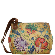 Anuschka Style 525, handpainted Triple Compartment Medium Crossbody With Adjustable Strap. Caribbean Garden painting
