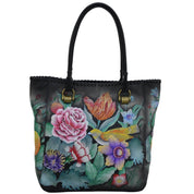 Anuschka style 609, handpainted Tall Tote With Double Handle. Vintage Bouquet Painted in Black Color. Featuring one open wall pocket, and two multipurpose pockets with removable fabric cosmetic pouch and optical case.