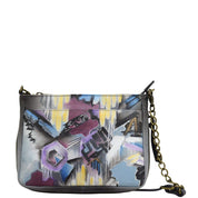 Anuschka Style 636, handpainted Compact Crossbody With Front Pocket. Urban Jungle painting