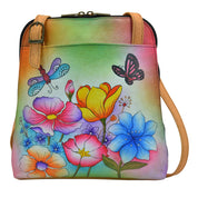 Anna by Anuschka style 7010, handpainted Zip Around Satchel. Floral Garden painting in yellow color. Featuring full length outer pockets (front and back) with magnetic closure, Fits E-Reader and tablet.