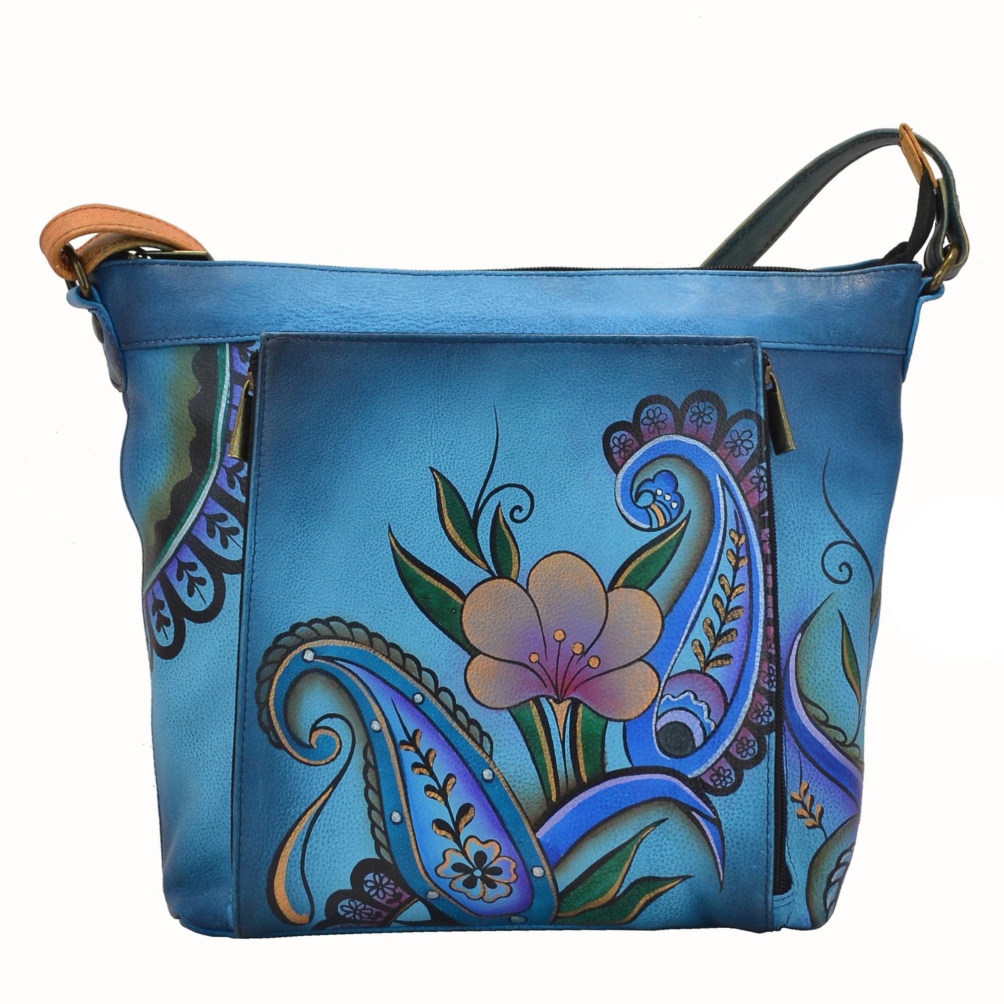 Anna by Anuschka style 7029, handpainted Travel Organizer. Denim Paisley Floral painting in blue color. Featuring inside full length wall pocket, cell pocket and credit card holders, adjustable crossbody handle, Built-in organizer, Fits tablet, Fits E-Reader.