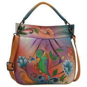 Anna by Anuschka style 8033, handpainted Convertible Tote. Portuguese Parrot painting in multi color. Featuring inside zippered wall pocket, cell and multi purpose pocket, small rope handle, Removable strap, Fits Laptop.