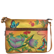 Anna by Anuschka style 8044, handpainted Organizer Crossbody. Country Flower painting in multi color. Featuring built-in organizer, all-round zippered, four card holders, two wall pockets, Fits Laptop.