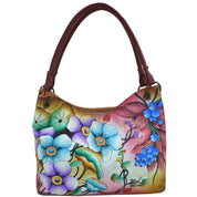 Anna by Anuschka style 8091, handpainted Large Magnetic Satchel. Floral Berries painting in multi color. Featuring two Magnetic closure entry to main compartment, Fits Laptop.