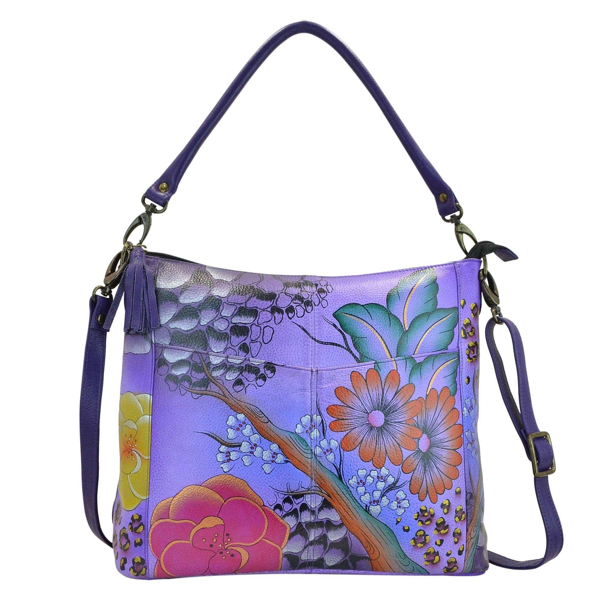 Anna by Anuschka style 8188, handpainted Convertible Shoulder Bag. Floral Safari Purple painting in purple color. Featuring inside one zippered wall pocket, one open wall pocket, two multipurpose pockets, Fits tablet, Fits E-Reader, Fits Laptop, Removable strap.