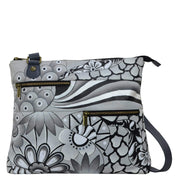 Anna by Anuschka style 8203, handpainted Large Crossbody. Patchwork Pewter painting in grey color. Featuring inside one full length zippered wall pocket, one open wall pocket, Fits tablet, Fits Laptop, Fits E-Reader.