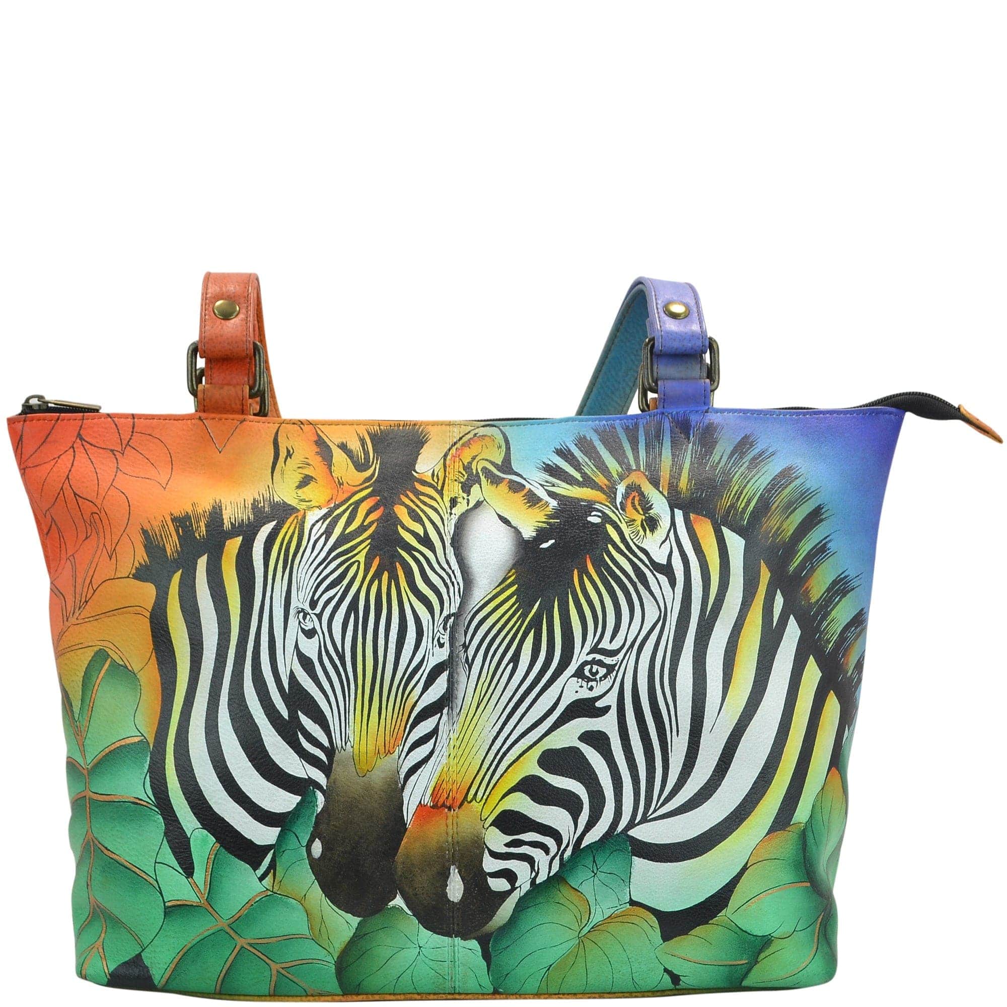 Anna by Anuschka style 8229, handpainted Large Tote. Zebra Safari painting in multi color. Featuring inside one zippered compartment, one zippered wall pocket, one open pockets, two multipurpose pockets, Fits tablet, Fits Laptop.
