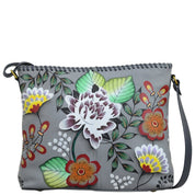 Anna by Anuschka style 8260, handpainted Shoulder Bag. Garden Of Eden painting in grey color. Featuring magnetic snap button entry to main compartment, One open wall pocket, two multipurpose pockets, Fits E-Reader, Fits tablet.