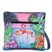 Anna by Anuschka style 8283, handpainted Medium Cross Body. Tropical Flamingos painting in purple color. Featuring inside zippered wall pocket, two multipurpose pockets, Fits E-Reader, Fits tablet.