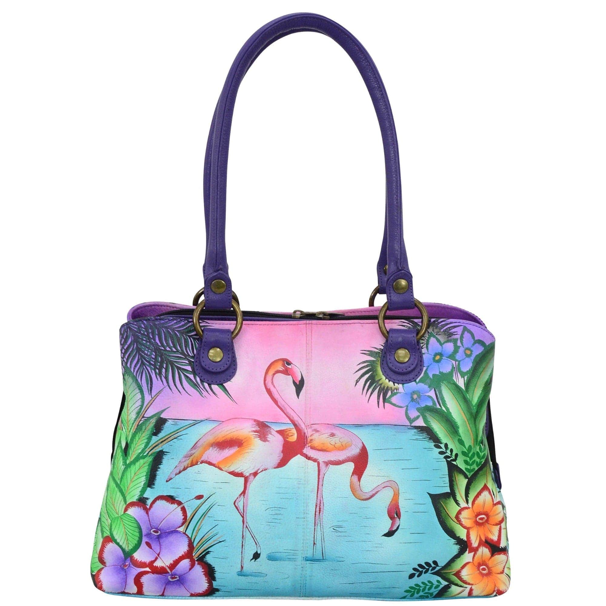 Anna by Anuschka style 8288, handpainted Multi Compartment Satchel. Tropical Flamingos painting in purple color. Featuring all round zip entry to central compartment and magnetic snap button entry to two compartments, Fits E-Reader, Fits tablet, Fits Laptop.