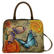 Anna by Anuschka style 8308, handpainted Slim Crossbody Satchel. Floral Paradise Tan painting in tan color. Featuring all round zip entry to main compartment, Fits E-Reader, Fits tablet.