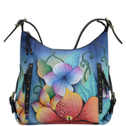 Anna by Anuschka style 8311, handpainted Shoulder Hobo. Midnight Floral painting in black color. Featuring inside zippered wall pocket, two multipurpose pockets, Fits E-Reader, Fits tablet.
