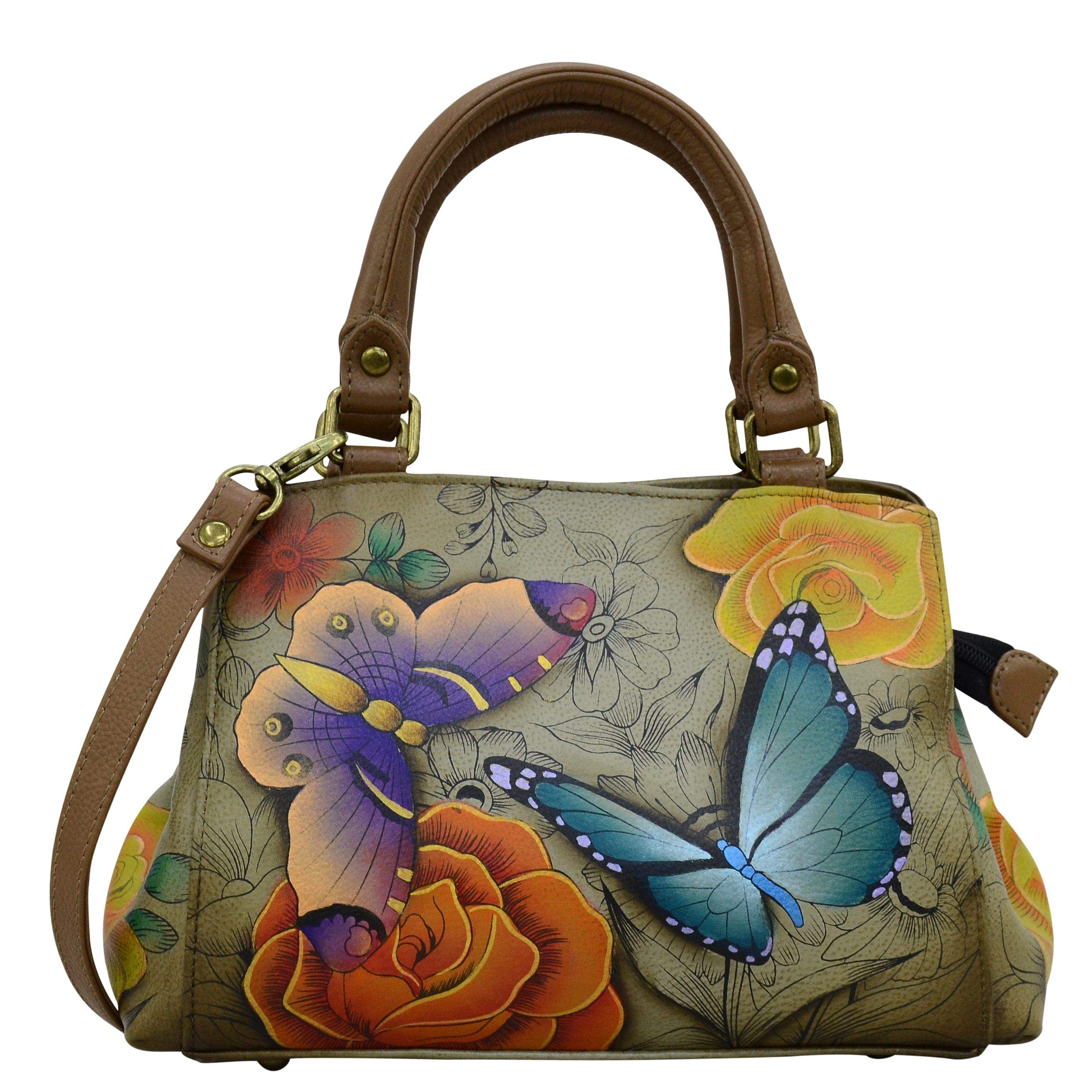 Anna by Anuschka style 8325, handpainted Small Multi Compartment Satchel. Floral Paradise Tan painting in tan color. Featuring One zippered central compartment and two open compartment, inside one full length zippered wall pocket two multipurpose pockets and rear full length zippered pocket.