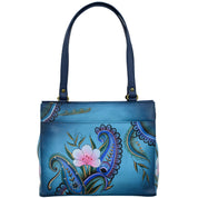 Anna by Anuschka style 8360, handpainted Medium Shoulder Bag. Denim Paisley Floral painting in blue color. Featuring four multipurpose slip in pockets and three card holders and pen holders.