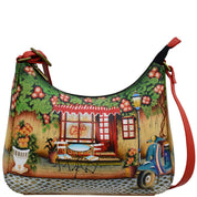 Anna by Anuschka style 8362, handpainted Large Hobo. Le Café painting in multi color. Featuring top zip entry to main compartment and inside zippered wall pocket, open wall pocket two multipurpose pockets.