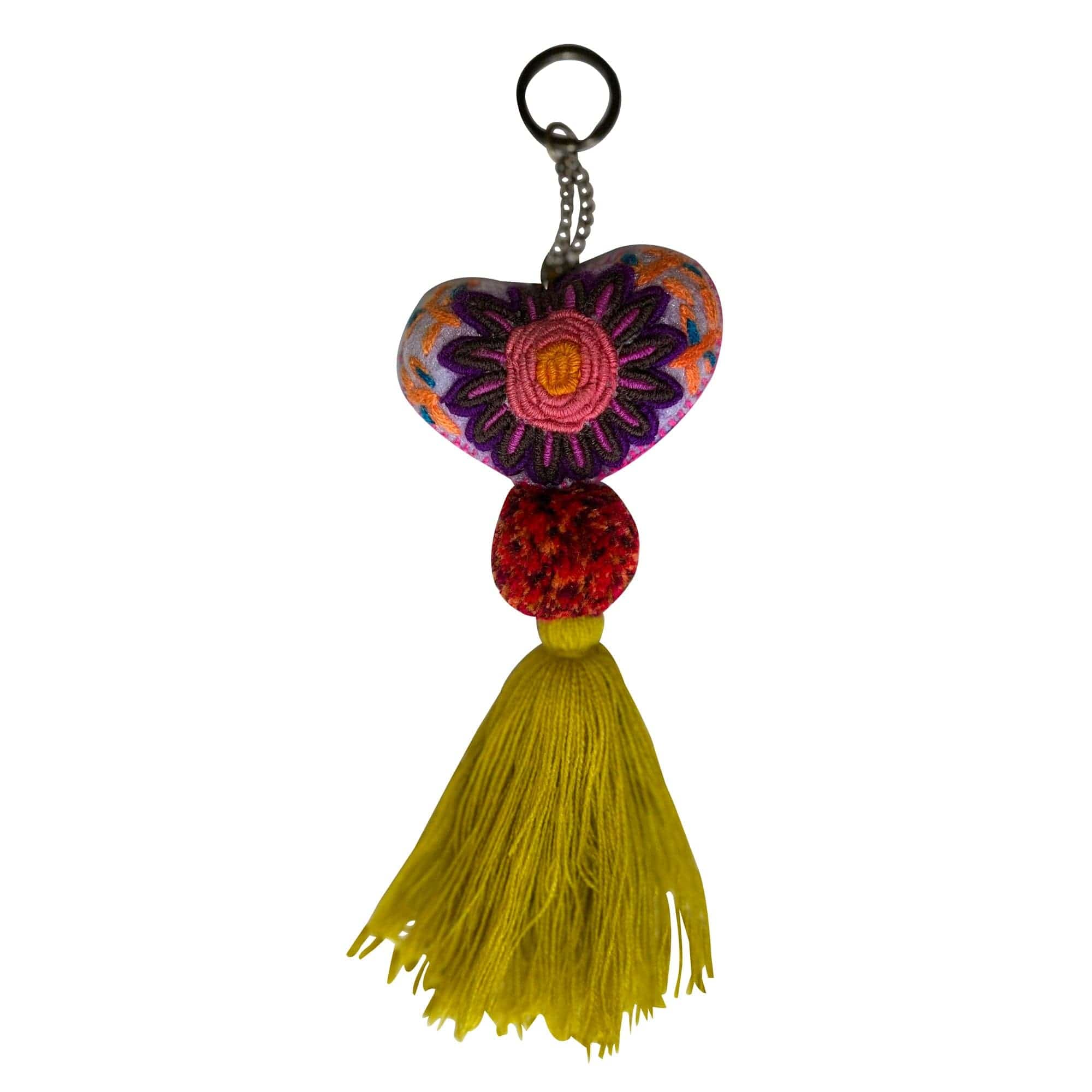 Anuschka style 12007, Hand Woven Charms from Oaxaca, Mexico. The handmade felt heart Keycharms have a beautiful embroidered floral design adorned with pompoms and tassels, from Oaxaca, Mexico.