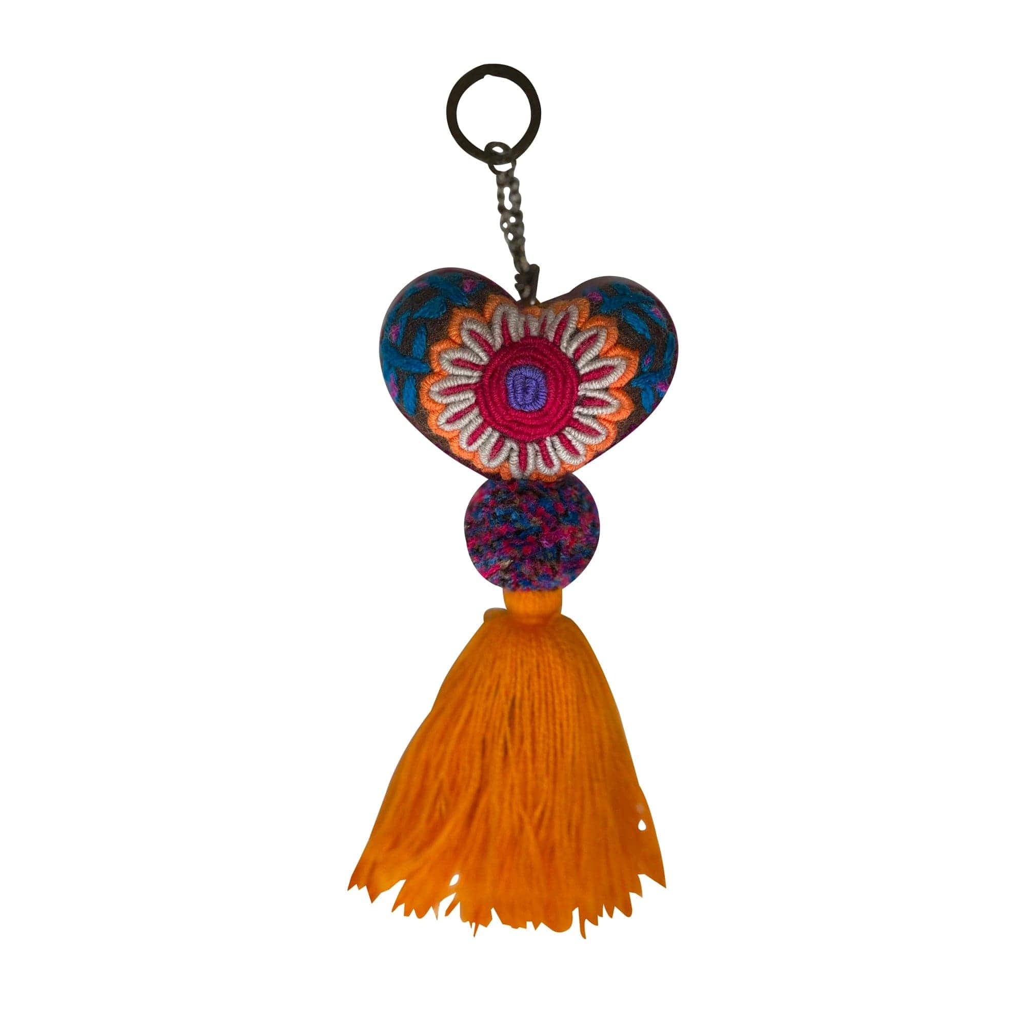 Anuschka style 12007, Hand Woven Charms from Oaxaca, Mexico. The handmade felt heart Keycharms have a beautiful embroidered floral design adorned with pompoms and tassels, from Oaxaca, Mexico.