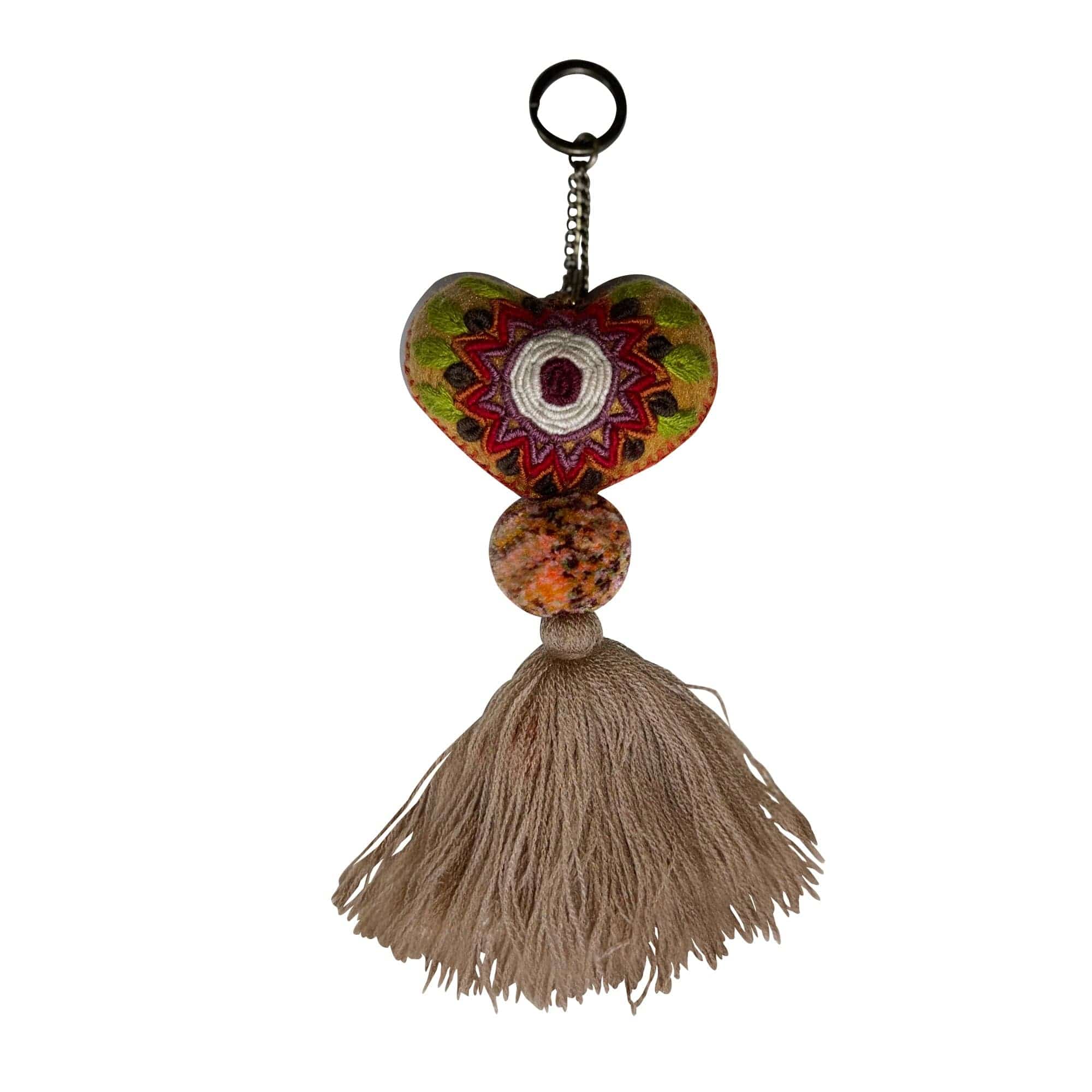 Anuschka style 12007, Hand Woven Charms from Oaxaca, Mexico. The handmade felt heart Keycharms have a beautiful embroidered floral design adorned with pompoms and tassels, from Oaxaca, Mexico.