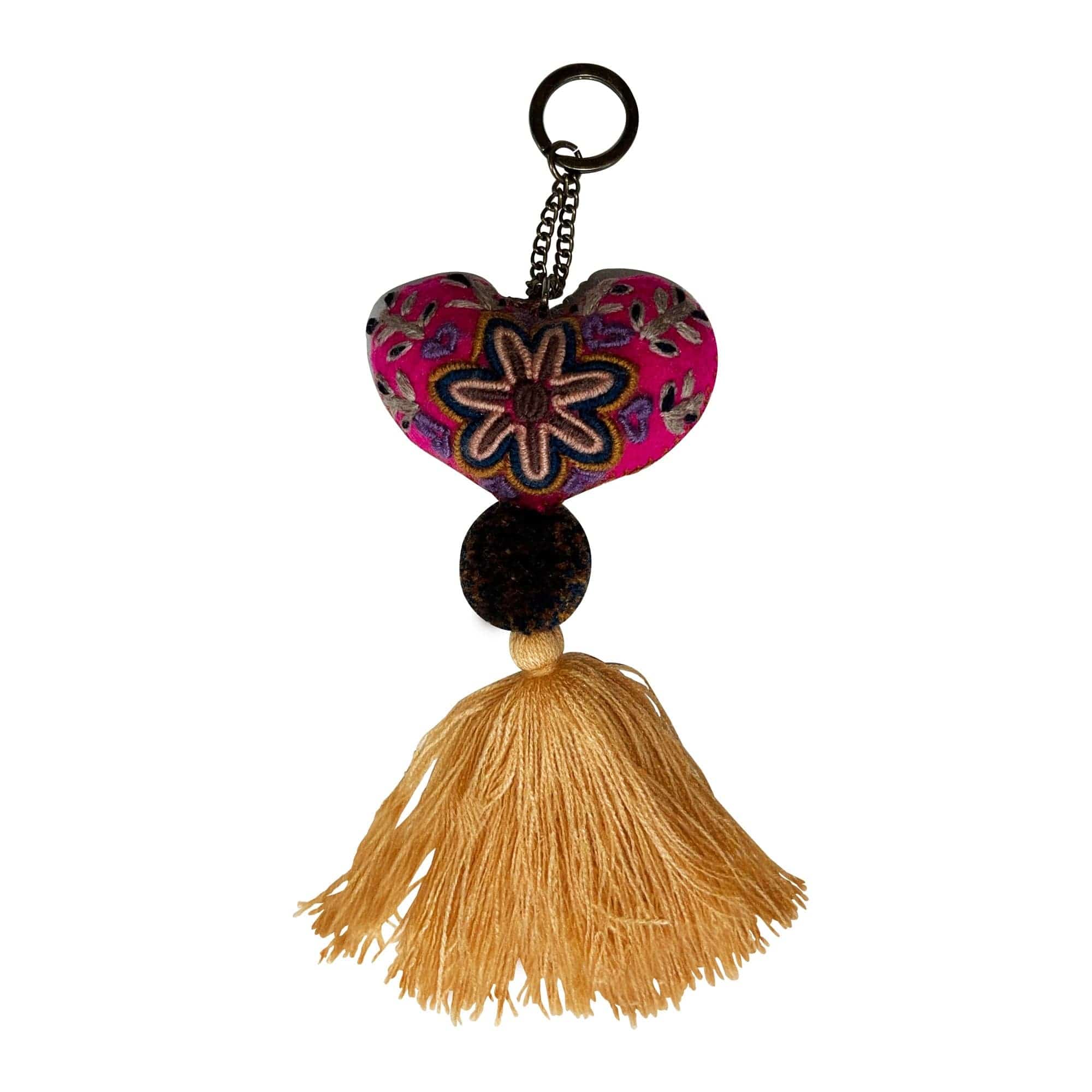 Anuschka style 12007, Hand Woven Charms from Oaxaca, Mexico. The handmade felt heart Keycharms have a beautiful embroidered floral design adorned with pompoms and tassels, from Oaxaca, Mexico.