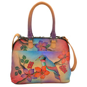 Anna by Anuschka style 8031, handpainted Medium Zip-Around Satchel. Bird on a Branch painting in red/wine color. Featuring inside zippered partition pocket, zippered wall pocket, multi-purpose pocket, Removable strap, Fits tablet and E-Reader.