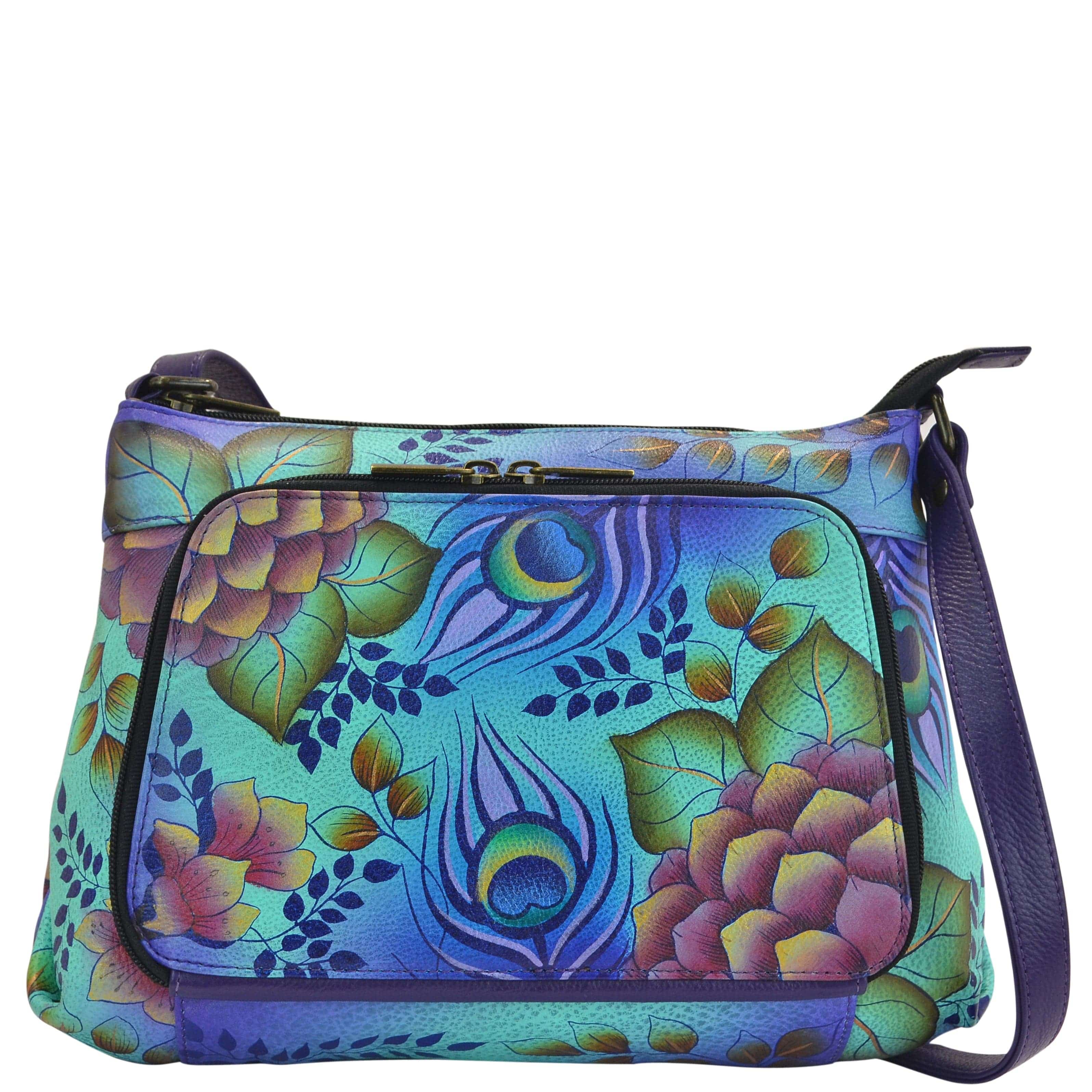 mint color. Featuring all round zippered entry, Inside one open pocket, one ID window, 4 credit card holders, one mobile case, Built-in organizer, Fits E-Reader, Fits tablet.