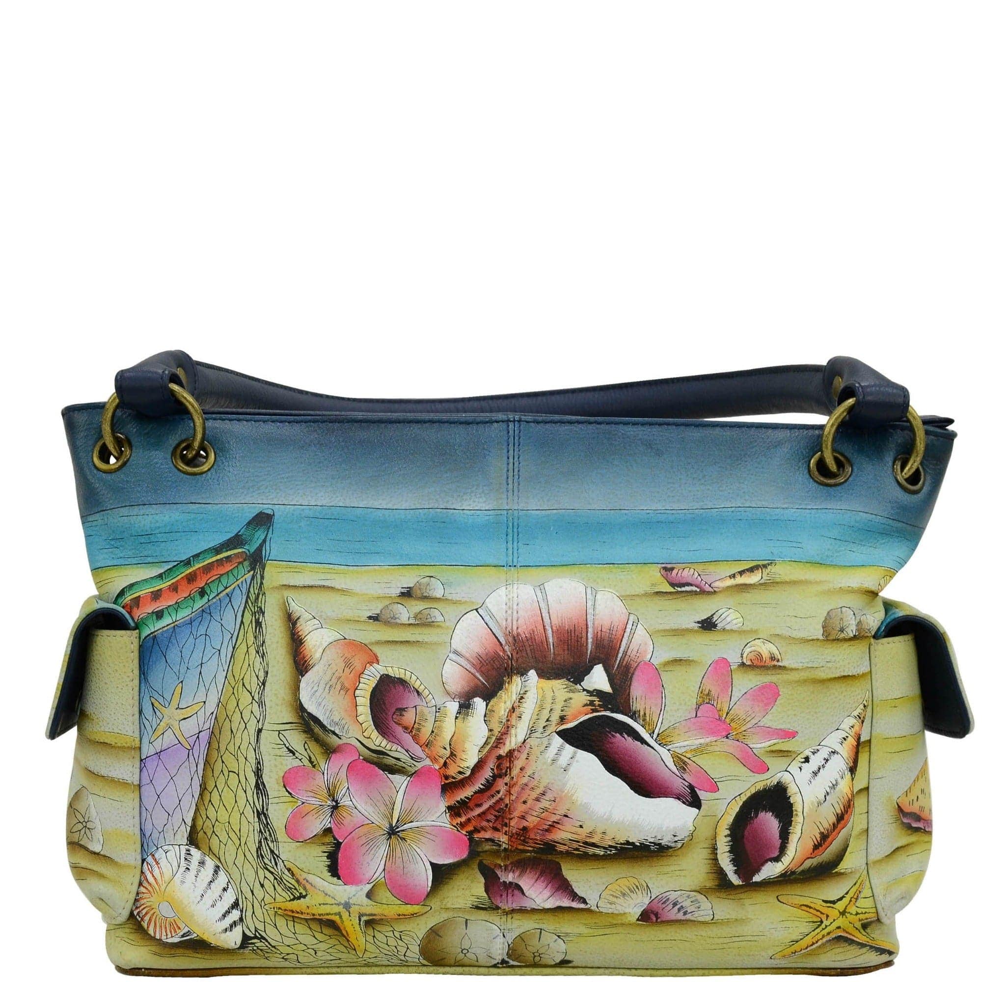 Anna by Anuschka style 8336, handpainted East West Shoulder Bag. Caribbean Dream painting in blue color. Faeturing inside one zippered wall pocket, two multipurpose pockets and two side pockets with magnetic flap.